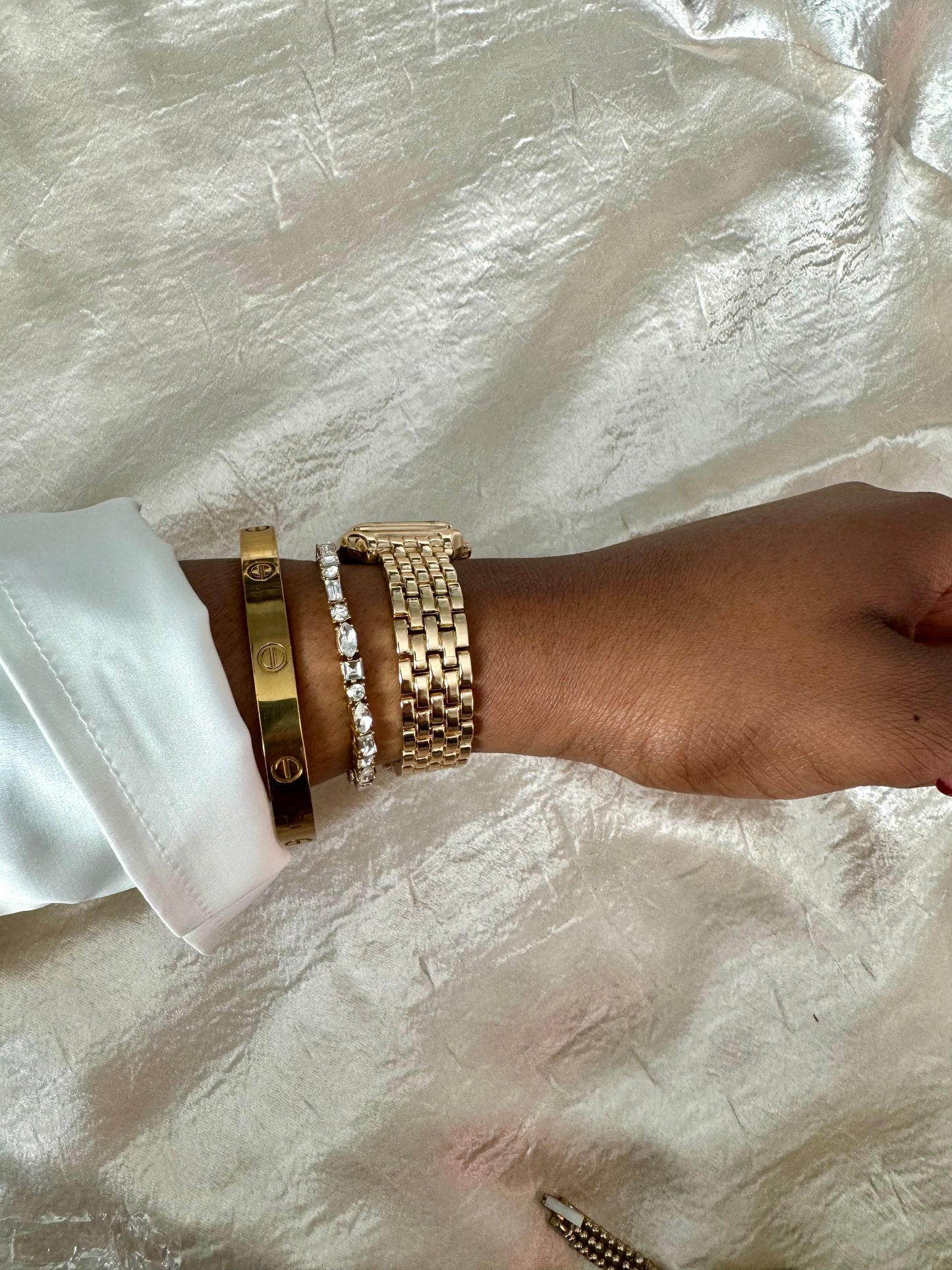 Square shaped gold watch