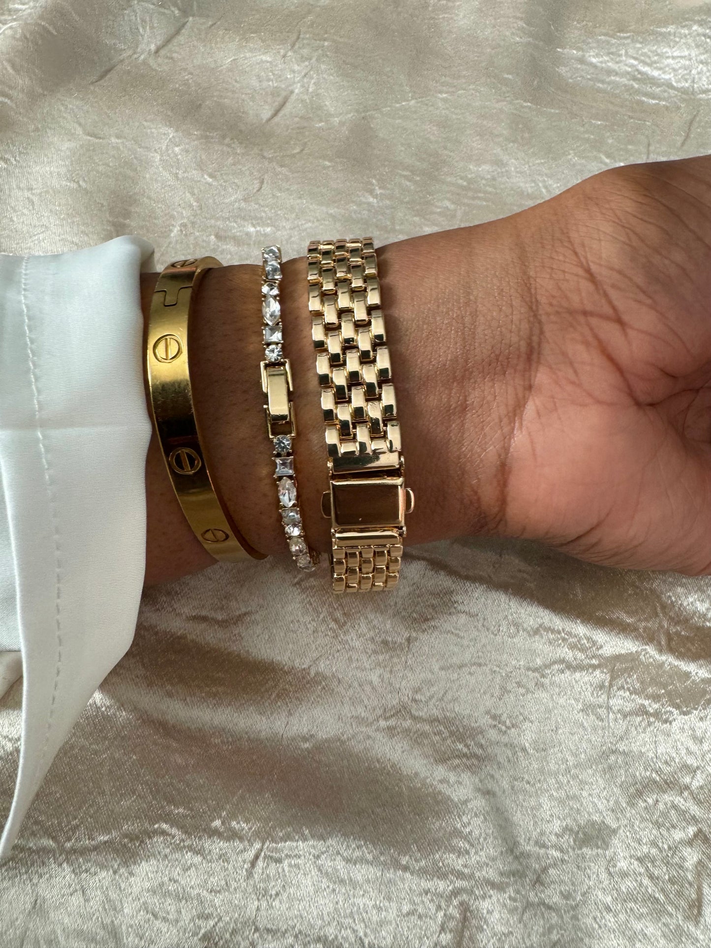 Square shaped gold watch